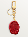 Diabolo de Cartier key ring with wax seal motif